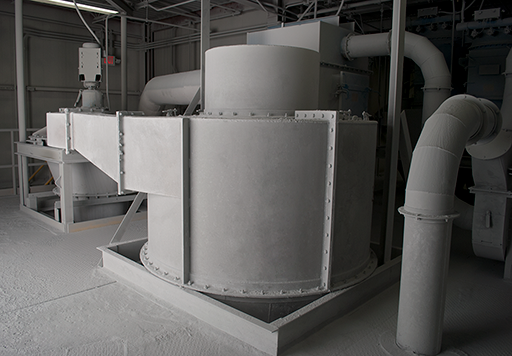 Installation of metal fabrication, painted gray (base is out of view, below ground level)