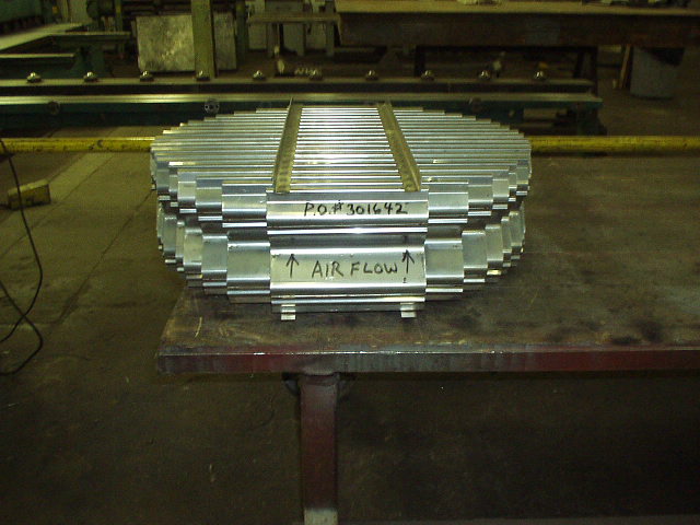 Mist eliminator about 2 feet in diameter on shop table