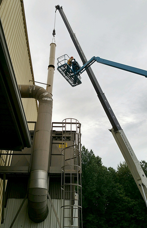 Crane extended, multi-stories high