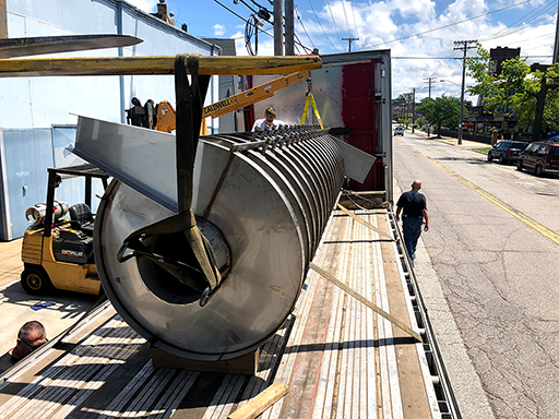 vibratory feeder loaded on semi truck flatbed