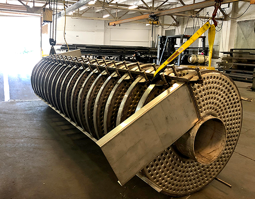 vibratory feeder on shop crane ready to load on a semi truck