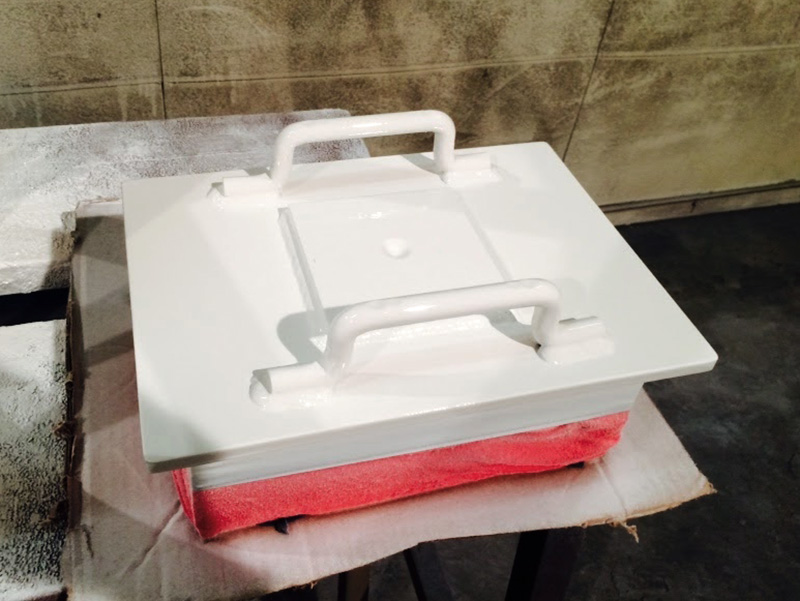 Painted door for a ceramic ball mill prior to install