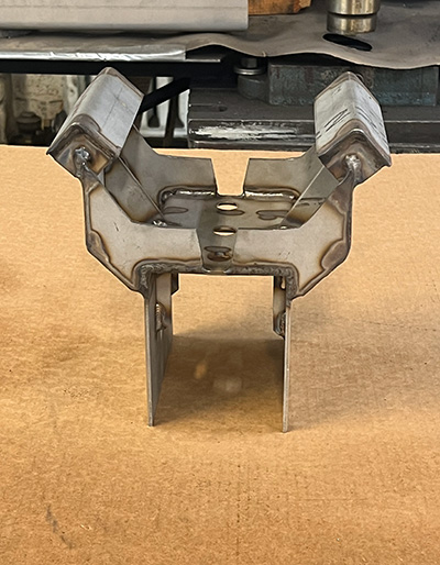 close-up of a boiler burner rack showing the detailed welds